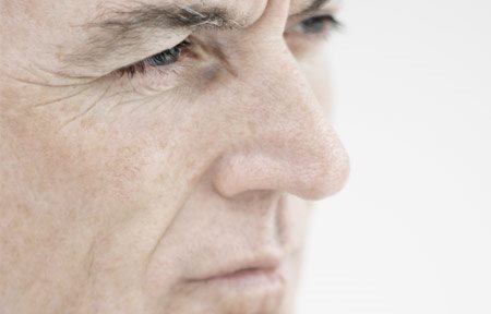 Obličej staršího muže zblízka
